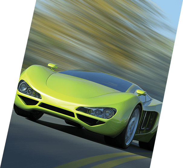 Green sports car driving in the side of the road