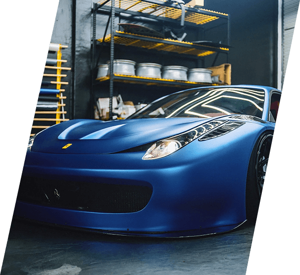 Blue sports car inside a garage