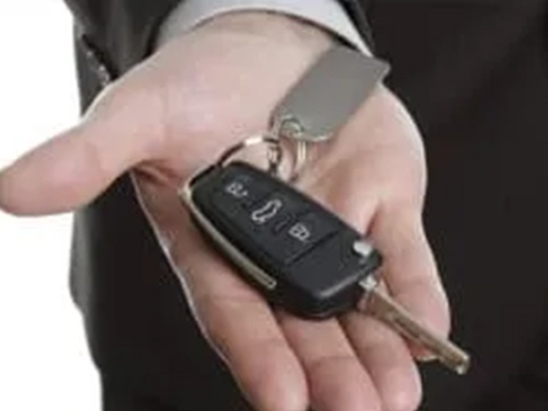 Man with keys in hand